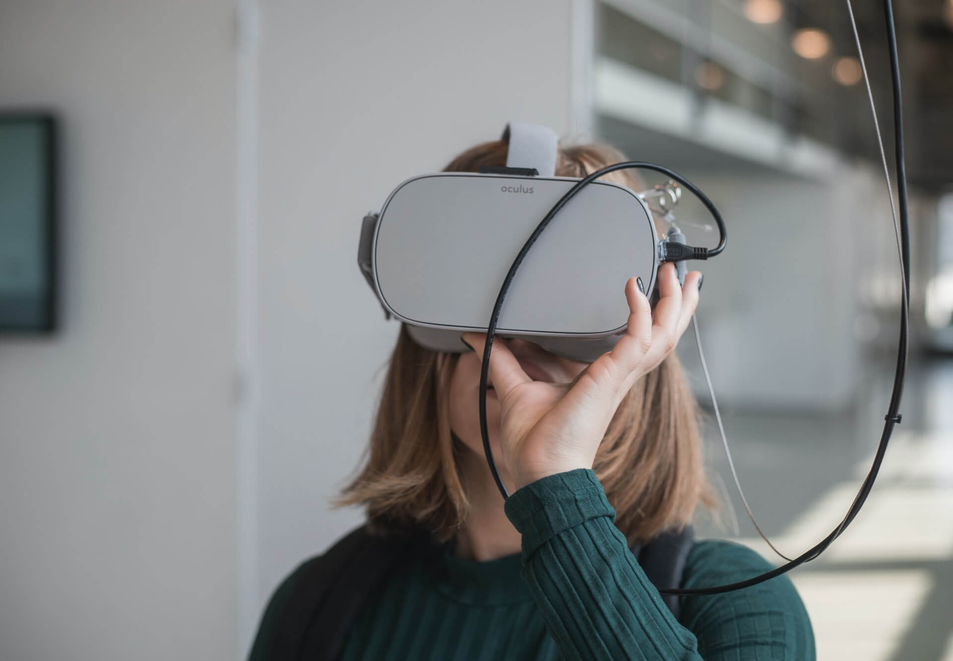 girl using VR headset